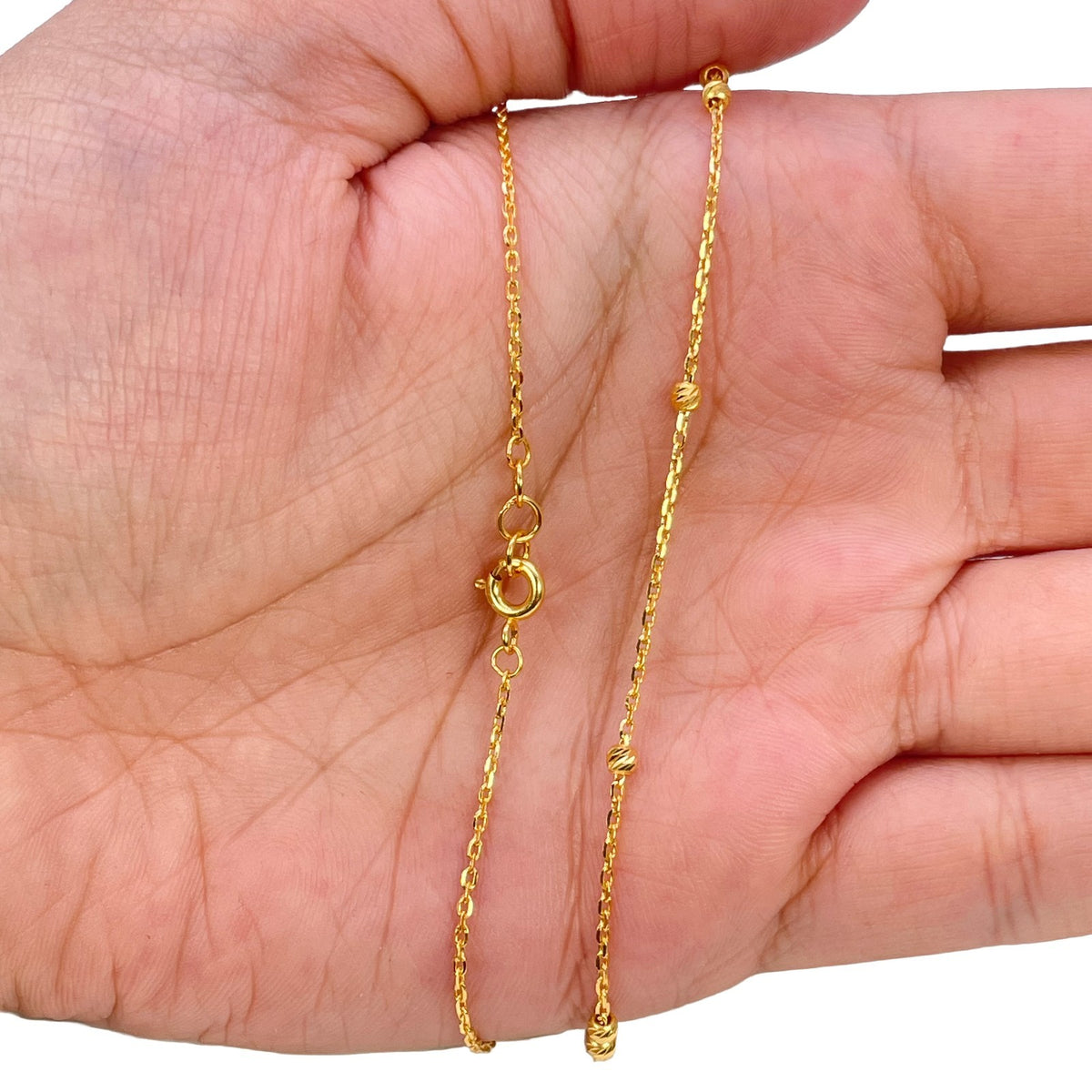 22ct yellow gold diamond cut bead layering necklace by Raina Jewels