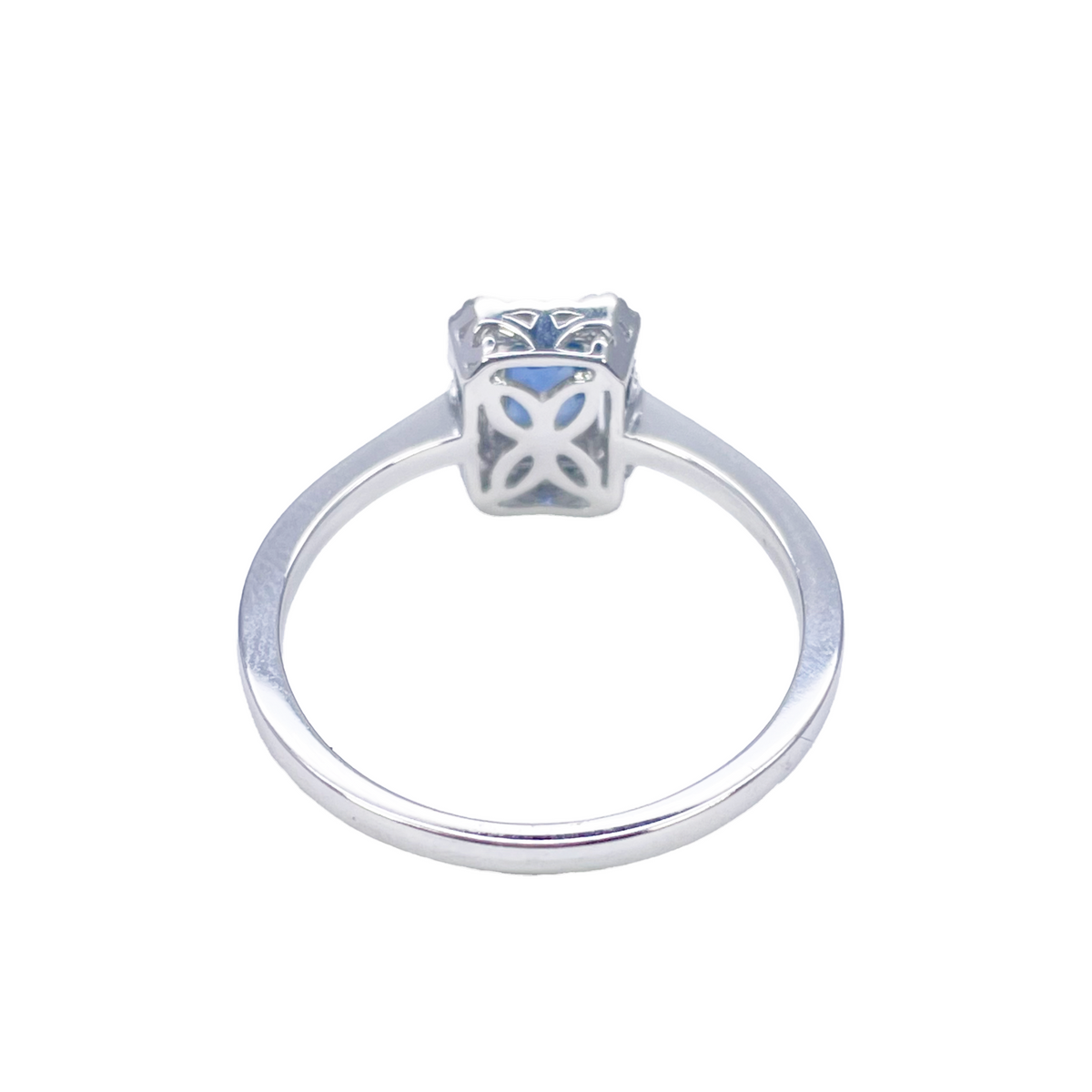 18ct White Gold Emerald Cut Blue Sapphire & Diamond Halo Ring 0.79ct